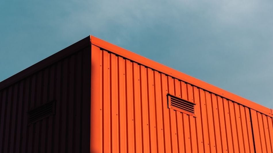 Close up of a vent on a red shipping container