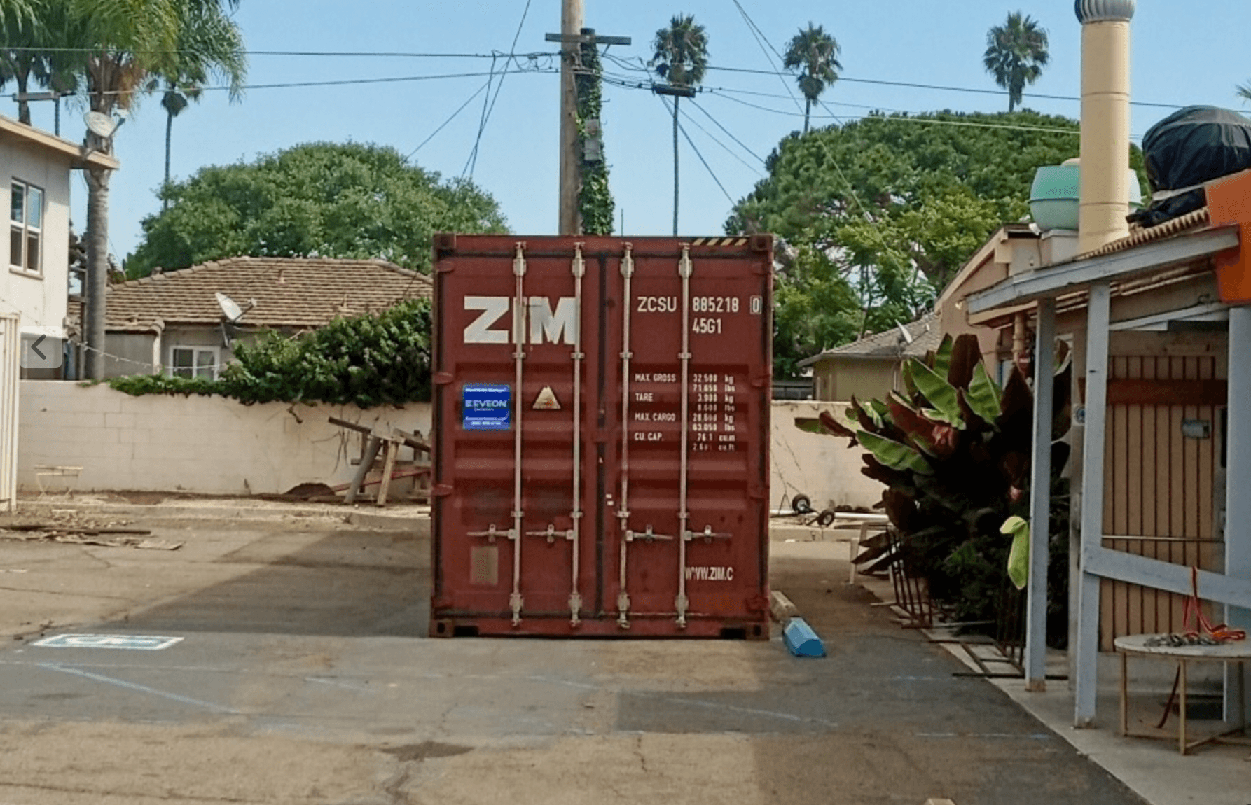 Red shipping container with Eveon sticker