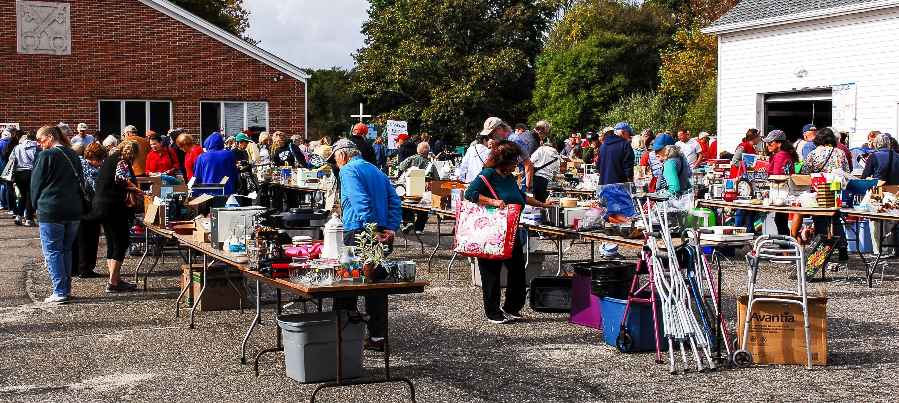 People browsing items for sale at 2025 Harvest Festival