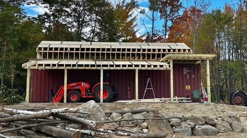 Roof being added to custom shipping container barn