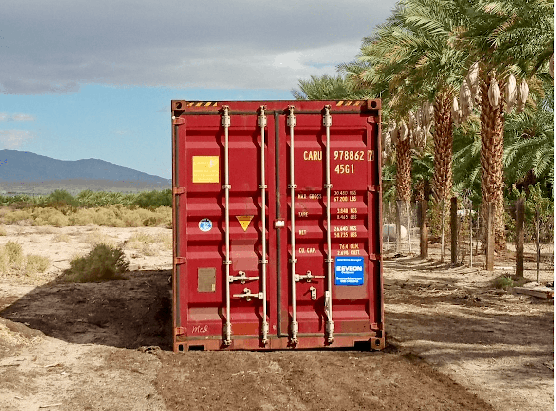 Red Eveon Container in a field