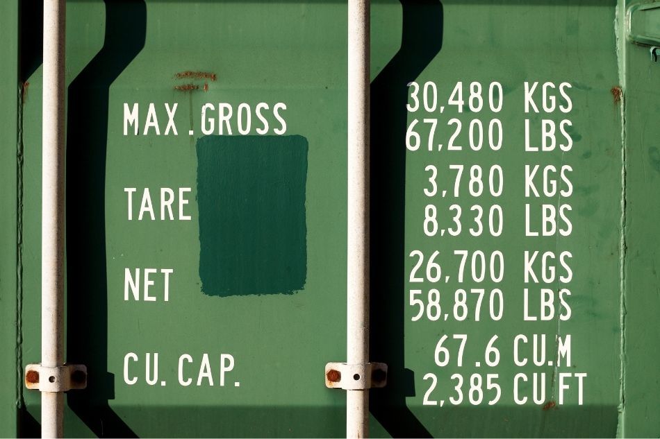Up close of the shipping container weights on side of container