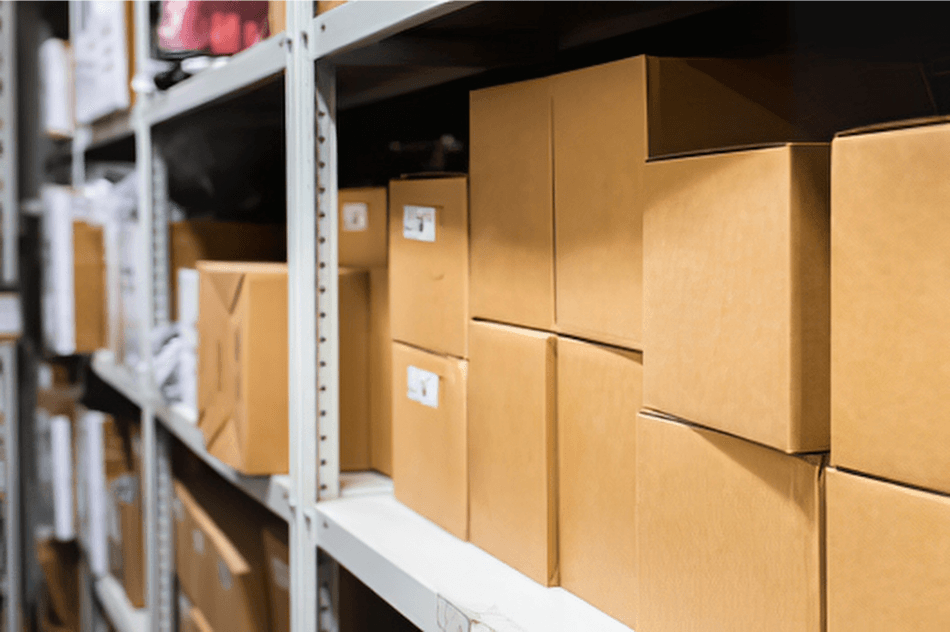 Cardboard boxes on shelves