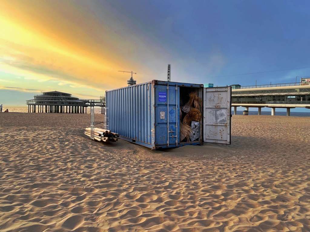 Blue Container with sunset in the background