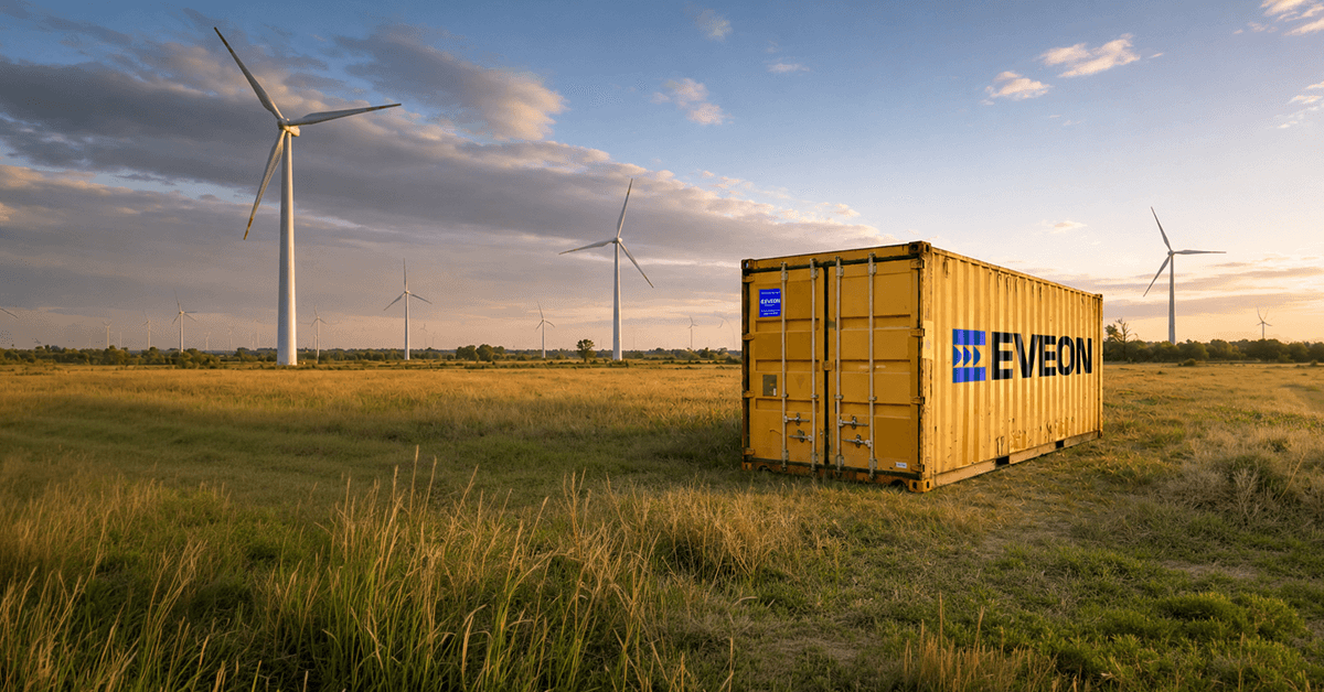 Yellow Eveon container in front of wind energy